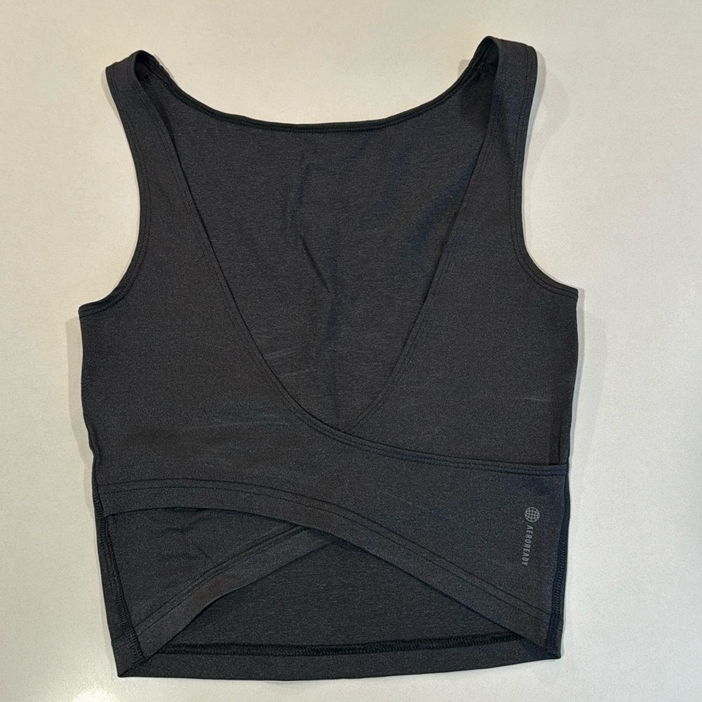 Shimmery black crisscross open back top